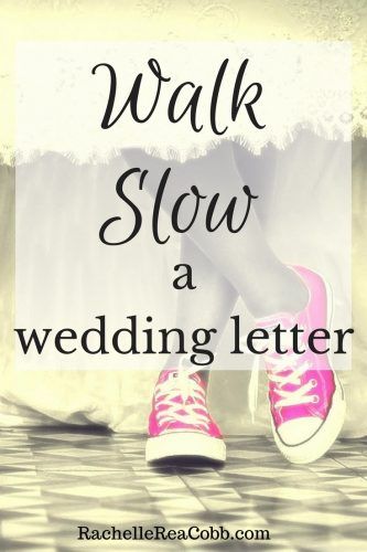 a woman's feet in pink tennis shoes with the words walk slow a wedding letter