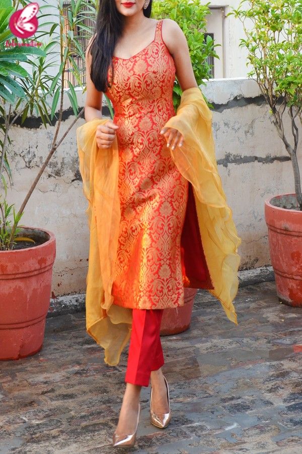 Red Golden Brocade Padded Kurti with Red Cotton Silk Pants and Golden Organza Ruffle Dupatta Red Chudidhar Designs, India Kurta For Women, Salwar Dress Designs, Festive Wear Indian Kurti, Suit Design With Pants, Banarasi Silk Kurta Set, Brocade Kurta Designs Women, Ruffle Kurti Design, Brocade Suits Designs