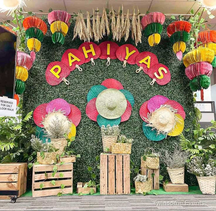 the display is decorated with paper fans and flowers