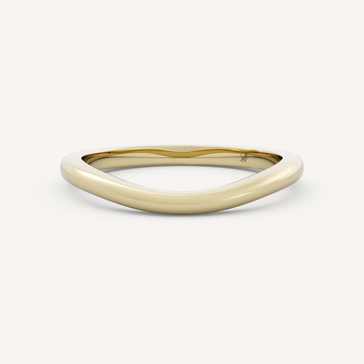 Cove features a graceful half round shank with a subtle contour. Elegant Yellow Gold Rounded Rings, Elegant Yellow Gold Semi-circle Jewelry, Elegant Everyday Jewelry With Polished Edges, Everyday Elegant Jewelry With Polished Edges, Classic Jewelry With Smooth Rounded Bezel, Classic Rings With Rounded Edges For Formal Occasion, Classic Rings With Polished Edges For Formal Occasions, Elegant 14k Gold Rings With Polished Edges, Elegant White Gold Jewelry With Polished Edges