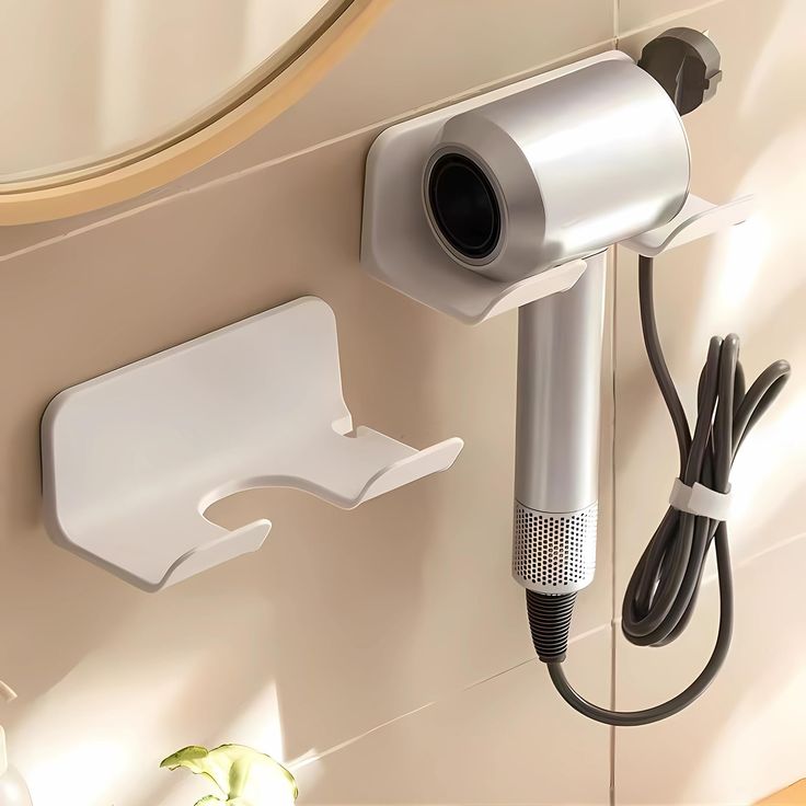 a hair dryer is plugged into the wall