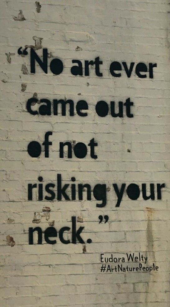 a brick wall with graffiti on it that says, no art ever came out of not risking your neck