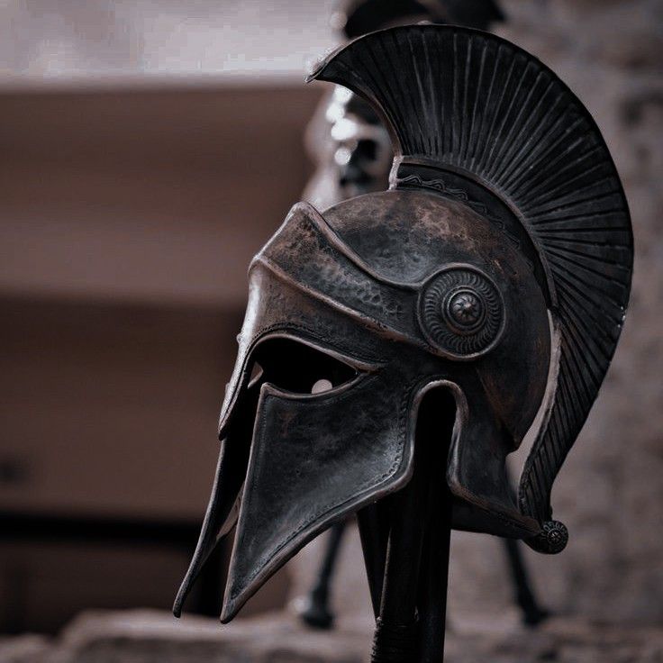 an ancient roman helmet on display in a museum