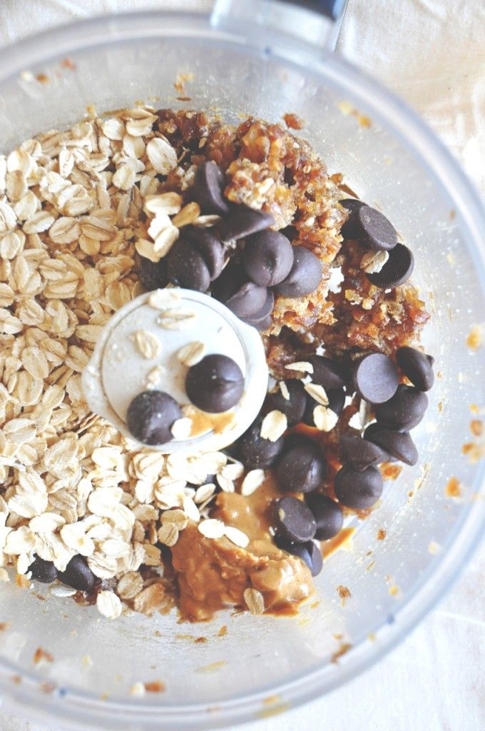 a food processor filled with granola and chocolate chips