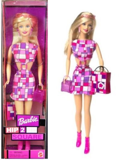 the barbie doll is wearing a pink dress and carrying a purple handbag in her hands