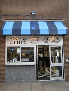 fish and chips restaurant on the side of a building