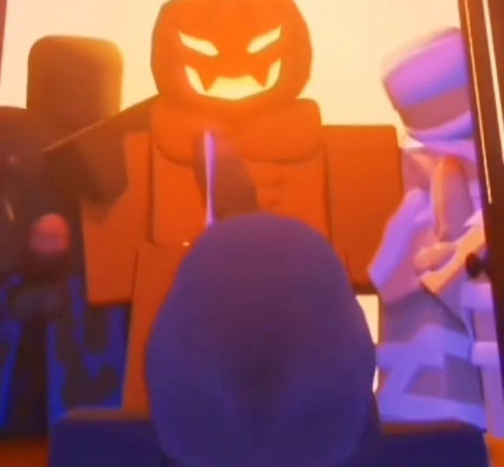 an animated image of a lego man with a pumpkin on his head and another figure in the background