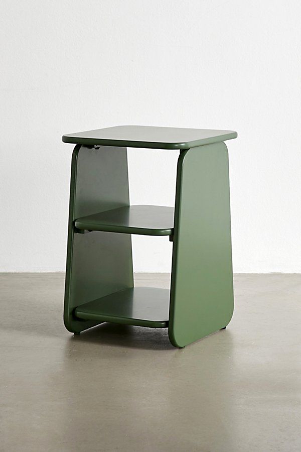 a green side table with two shelves on each side and one shelf below the top