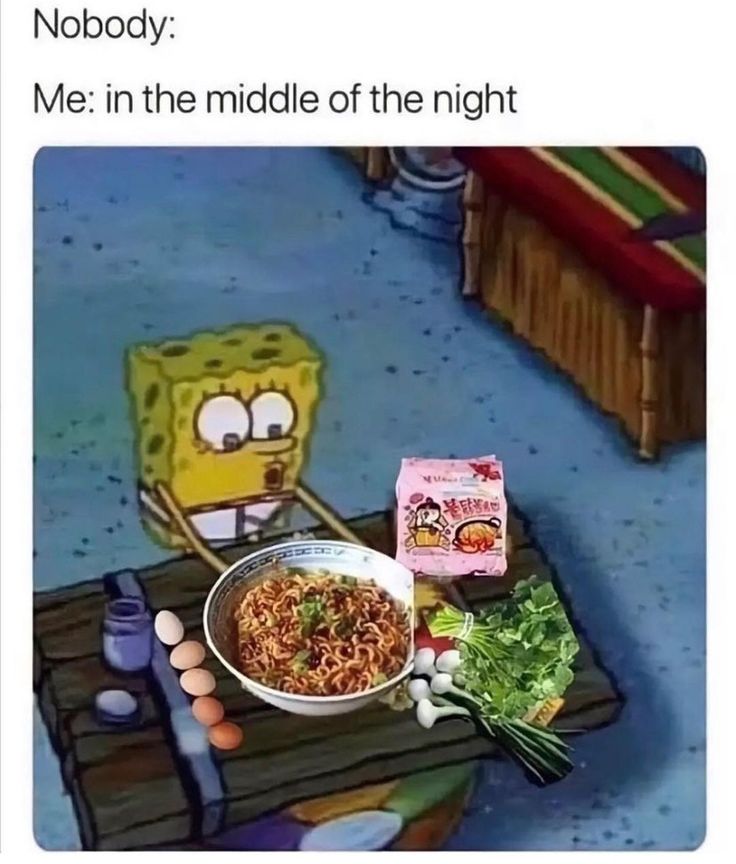 a bowl of noodles and some vegetables on a table with spongebob in the background