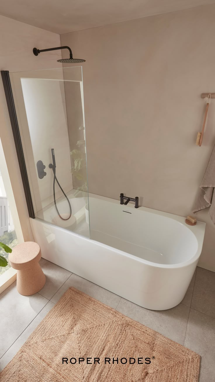 Designed with the smaller format of the British bathroom in mind, our Note bath collection is perfect for those looking for a modern silhouette that feels a little softer. Corner Bath Shower, Freestanding Bath With Shower, British Bathroom, Black Cabinets Bathroom, Bath Top, Shower Over Bath, Roper Rhodes, Modern Bathtub, Bathroom Layouts