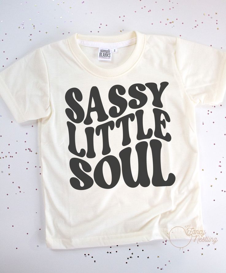 This sassy little soul kids t-shirt is made of 100% polyester, making it lightweight and breathable, perfect for active play. The material also helps keep colors bright, so your little one will always be looking stylish. *All tee brands run true to size. The graphic used on our tees are sublimation prints which means its printed into the fabrics on the shirt. No more peeling! *Care Instructions: Turn inside out & wash in cold. Lay Flat to dry. Do Not Iron. Sassy Graphic Tees, Cricut Graphic Tee Ideas, Fun Tshirt Ideas, Toddler Girl Shirt Ideas, Toddler Girl Shirts Vinyl, Cricket T Shirt Design Ideas, Toddler T Shirt Ideas, Kids Svg Shirts, Kids Cricut Shirts