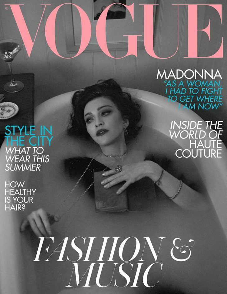 a magazine cover with a woman in a bathtub