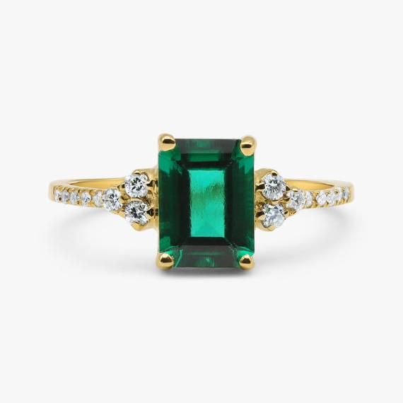 Emerald and diamond ringVintage inspired handmade Emerald and Diamond ring.This ring showcases a beautiful Green Emerald 8 x 6 mm Octagon cut surrounded by Excellently cut brilliant Diamonds.Handmade by artist in solid gold with an utmost attention to details.Beautifully finished with Each diamond and gemstone handpicked and inspected for the best color and depth.`Get this ring today and enjoy it forever!- Made to Order, perfectly finished, Fast shipping fully insured and traceable online.- Gems Timeless Emerald Ring With Accent Stones For Promise, Classic Promise Diamond Ring For May Birthstone, Gold Emerald Ring With Diamond Accents, Classic Emerald Ring For Promise, Classic Emerald Diamond Ring With Accent Stones, Classic Diamond Ring With Accent Stones For May Birthstone, Classic Green Birthstone Ring With Accent Stones, Classic Emerald Birthstone Ring With Accent Stones, Classic Emerald Diamond Promise Ring