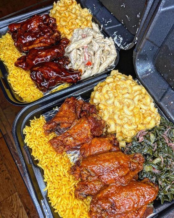 two trays filled with different types of food