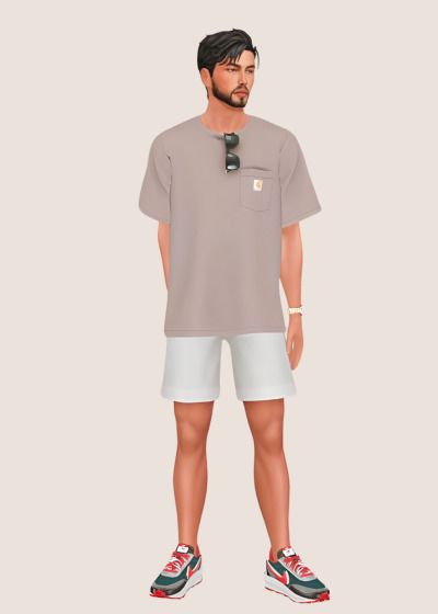 a man wearing shorts and a t - shirt is standing with his hands in his pockets