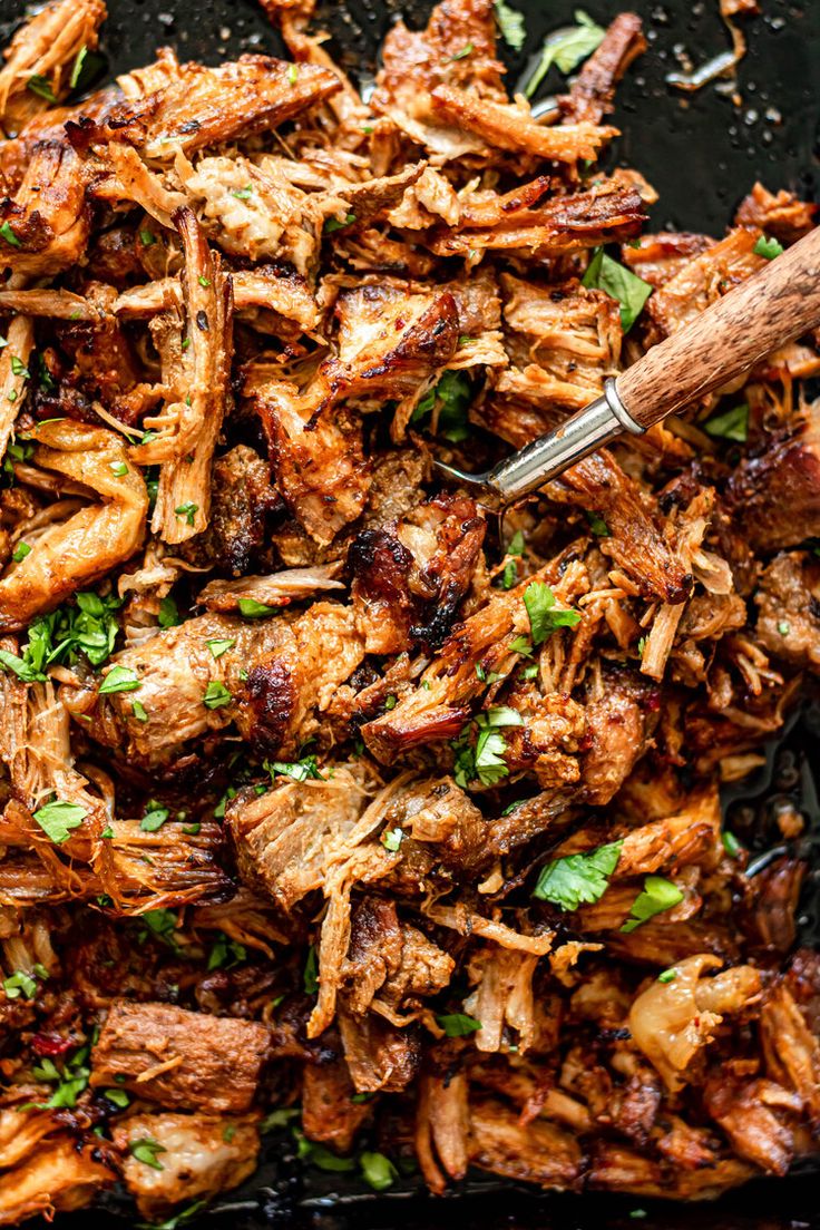 the food is being prepared and ready to be eaten on the grilling pan with tongs