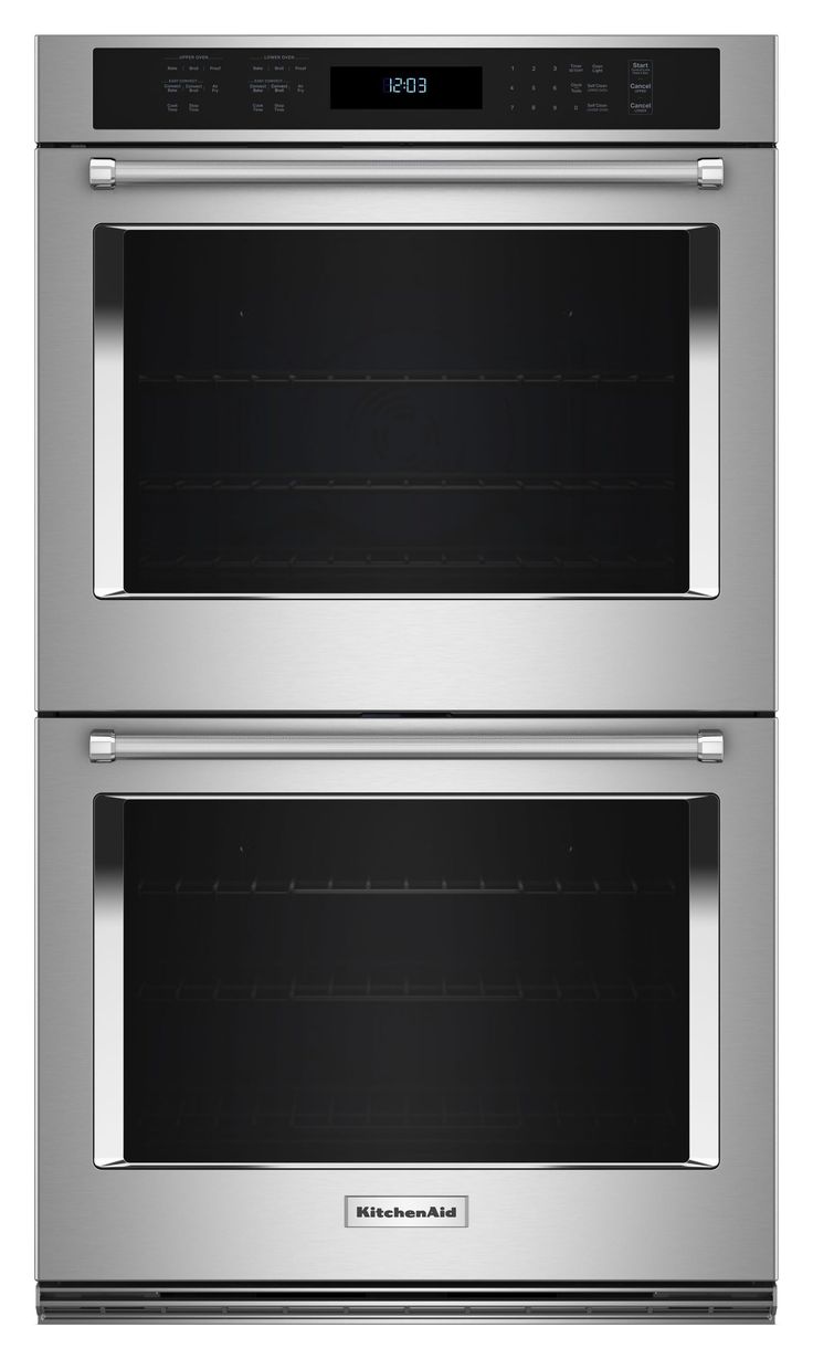 two double ovens side by side with the door open