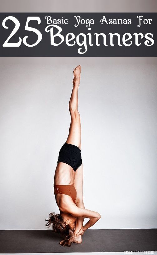 a woman is doing a handstand on the floor