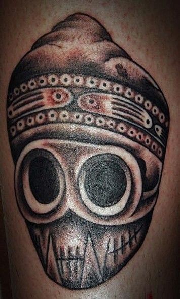 a skull with a hat on it's head is shown in this tattoo design