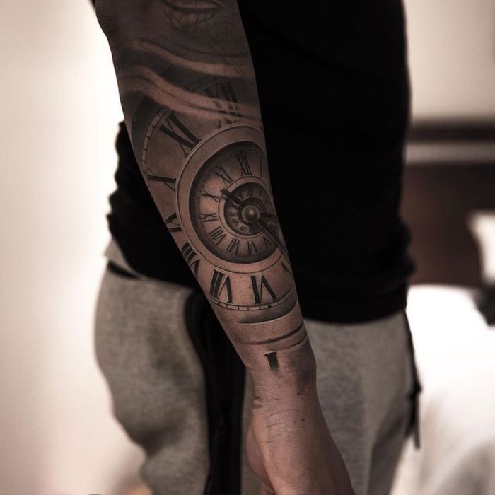 a man with a clock tattoo on his arm