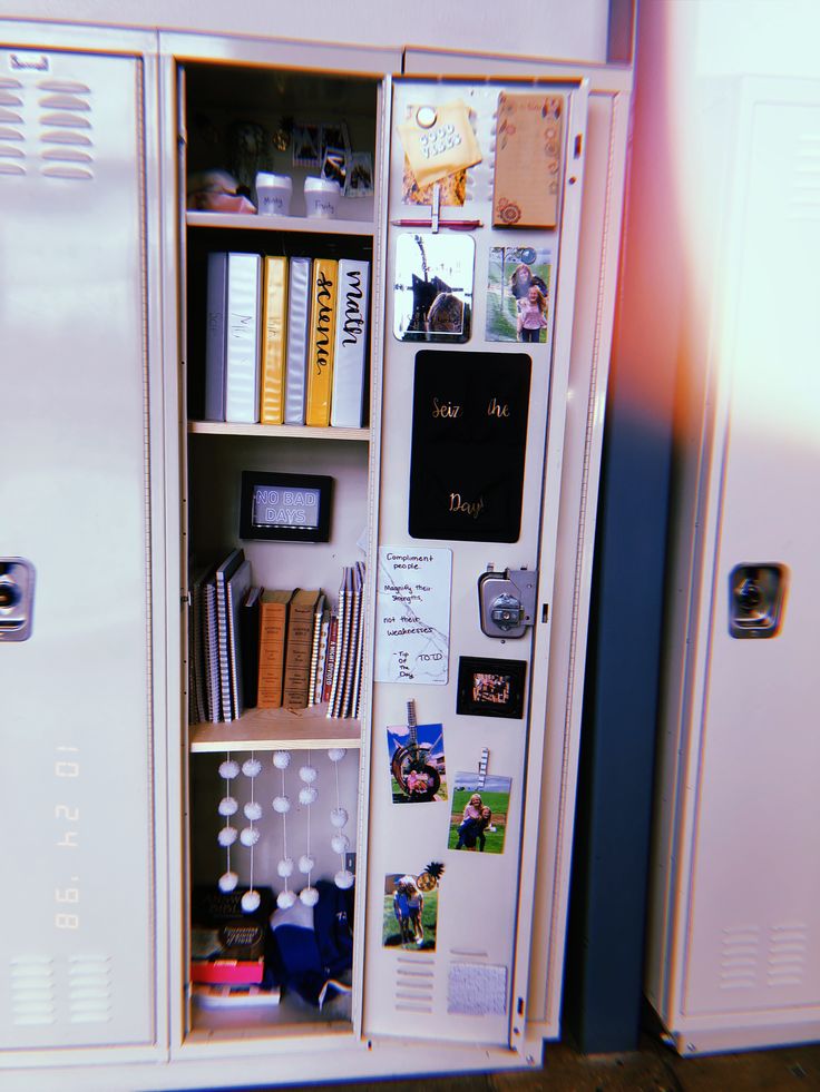 two white lockers with books and pictures on them