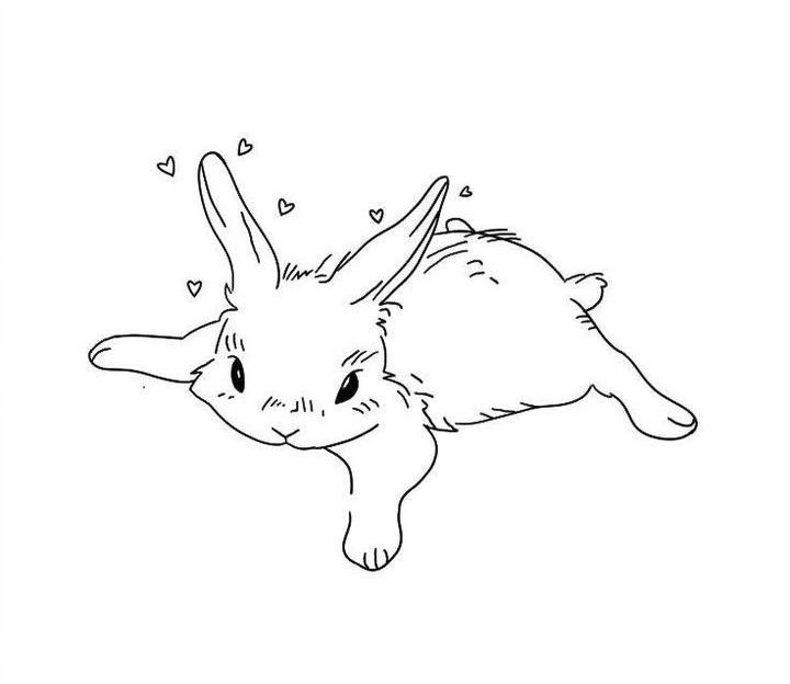 a rabbit is floating in the air with hearts on its back