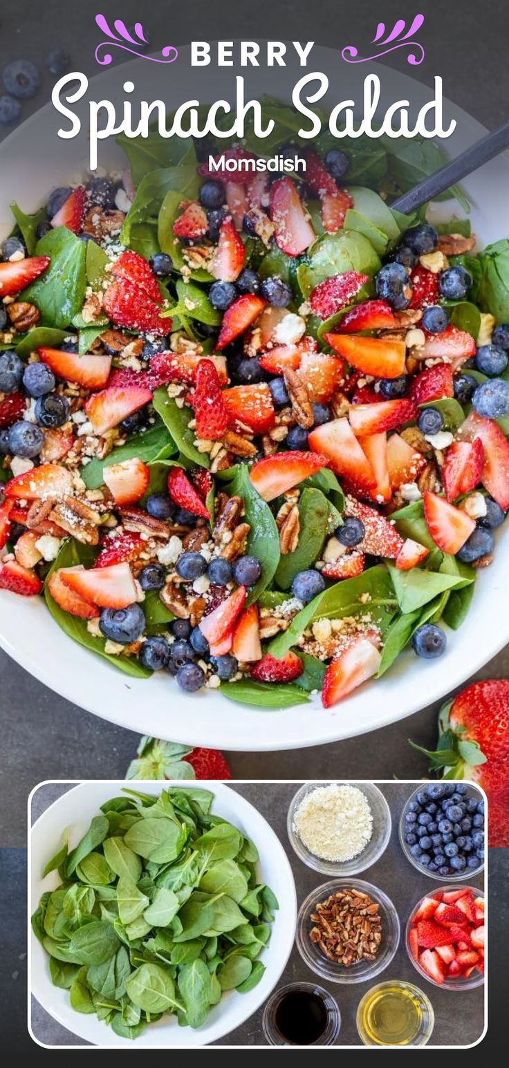 a salad with spinach, strawberries and blueberries in it