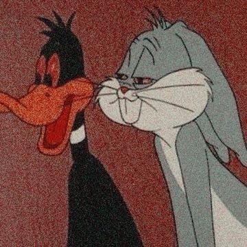 an image of two cartoon birds kissing each other