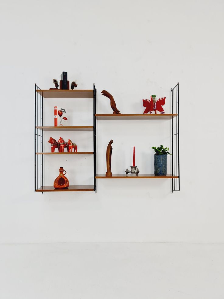 two shelving units with various items on them