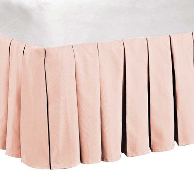 the bed skirt is made with pleated material