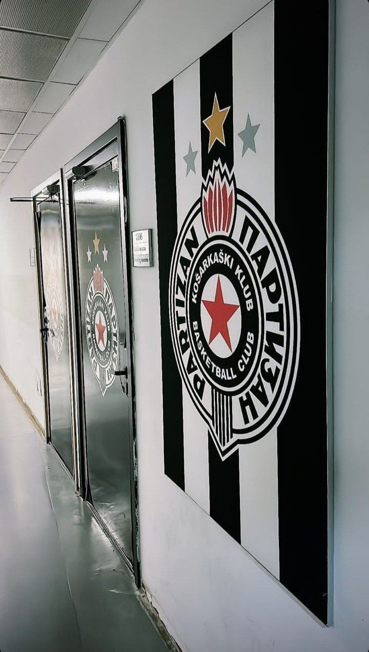 an image of a hallway that is decorated with black and white stripes, stars and emblems