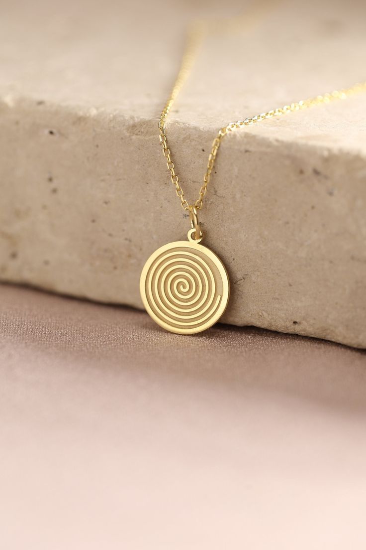 Gold Spiral Pendant - Geometric Gold Necklace ● Material of pendant: Solid Gold 14k ( REAL GOLD ) ● Metal Stamp: 14k ( REAL GOLD ) ● The pendant is available in 5 sizes: - 12,7 mm / 0.5 inches (Diameter) - 14,0 mm / 0,55 inches ( Diameter ) In the photos - 15,3 mm / 0.6 inches ( Diameter ) - 16,5 mm / 0,65 inches ( Diameter ) - 19,1 mm / 0,75 inches ( Diameter ) ( In the photos the size is 14mm / 0.55 inches Diameter ) ( Jump Ring inner diameter: 4 mm ) ● Material of chain: Solid gold 14k ( REAL Yellow Gold Swirl Jewelry Gift, Swirl Shaped Yellow Gold Jewelry Gift, Handmade Spiral Yellow Gold Jewelry, Elegant Swirl Necklace For Gift, Elegant Swirl Necklace For Gifts, Gold Spiral Jewelry, Swirl Shaped Sterling Silver Jewelry In Gold Color, Minimalist Gold Spiral Jewelry, Handmade Gold Swirl Jewelry