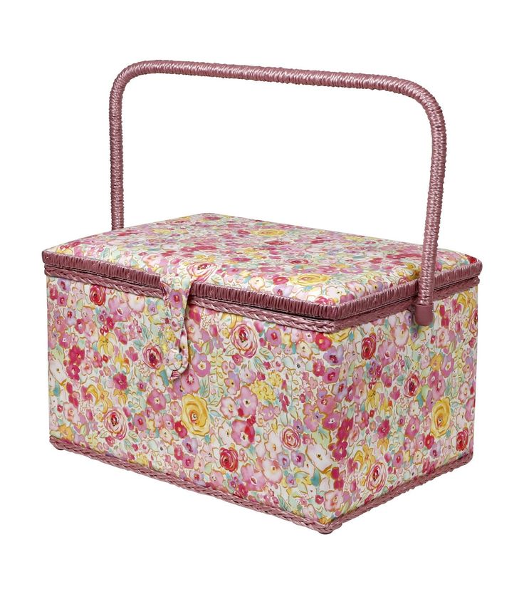 a pink and yellow flowered box with handle on the front, sitting against a white background