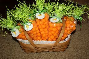 a basket filled with lots of carrots on top of a brown carpeted floor