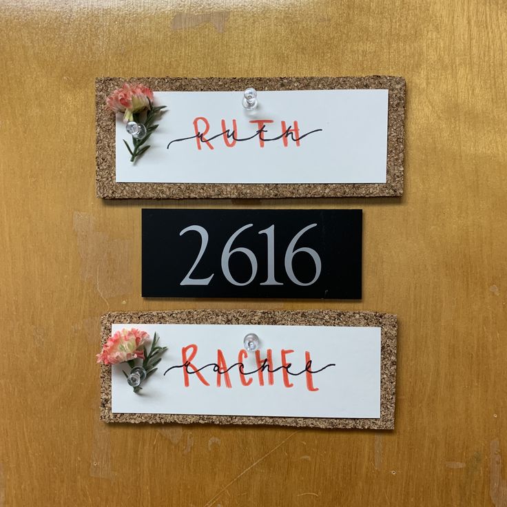 two door signs with flowers on them that say ruth and rachel