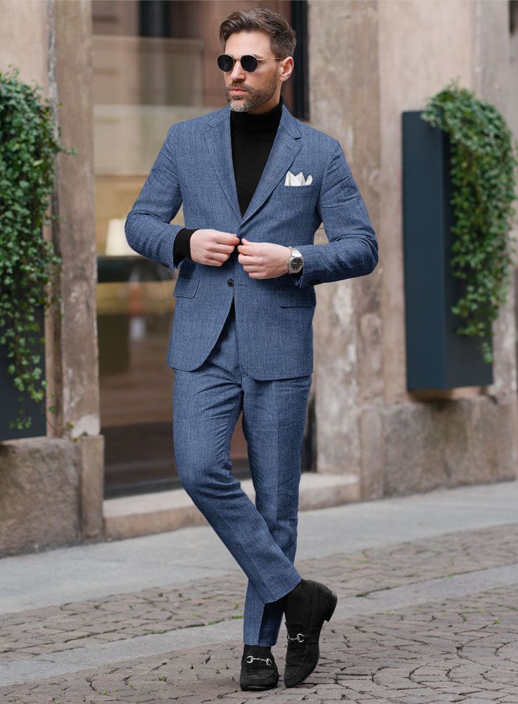 Inject an effortless and authentic style into your wardrobe with our Stylbiella Spring Smoked Blue Linen Suit. Expertly crafted from pure linen, this suit is designed for supreme comfort and lasting durability. It features a smoked blue color with a subtly textured finish that appears uniformly smooth from afar, making it an essential staple for any refined wardrobe. This piece effortlessly combines authentic style with practical elegance, ensuring it becomes a favorite for various occasions.