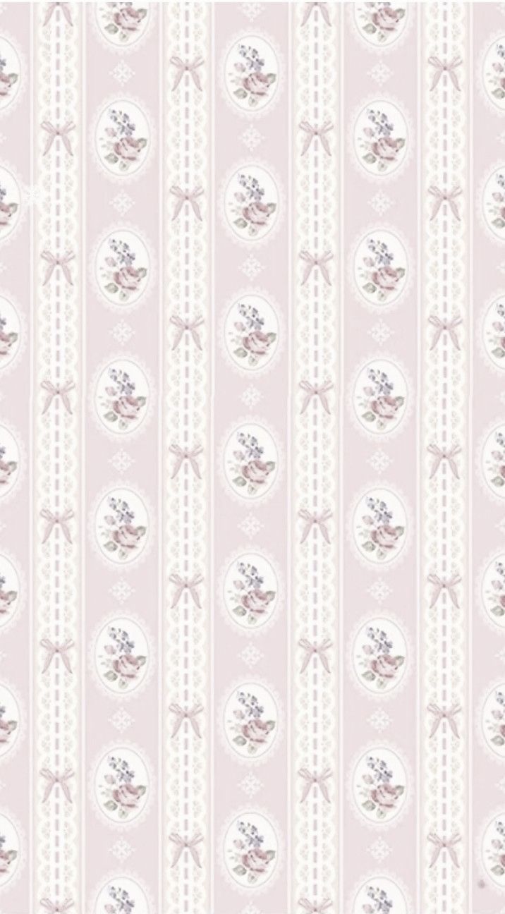 a pink and white striped wallpaper with flowers