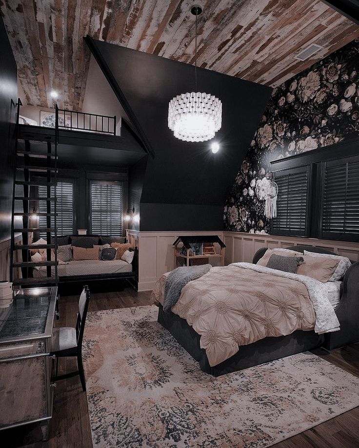 a bedroom with a bed, desk and ladder in the ceiling is decorated with flowers