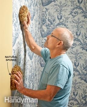 an older man is painting a wall with blue toiler