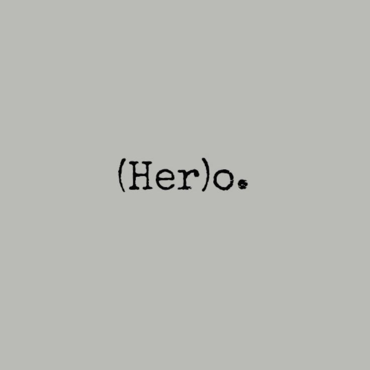 the word hero written in black ink on a gray background