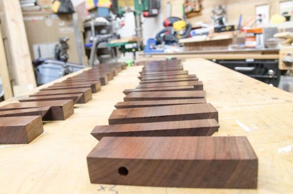 several pieces of wood sitting on top of a table