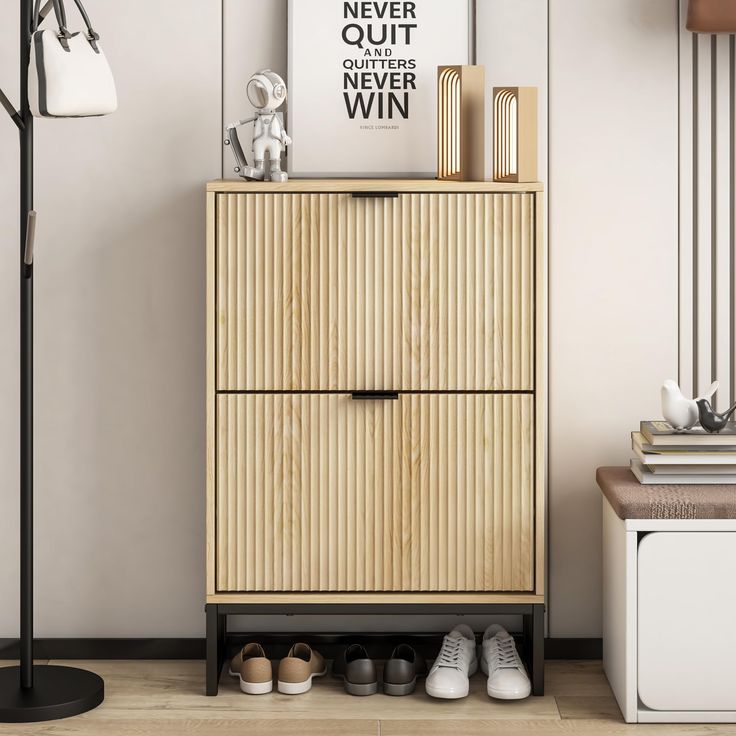 a wooden cabinet with shoes on it next to a lamp