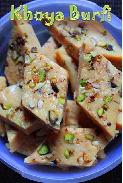 some kind of food in a blue bowl on a table with the words khuya burf written above it