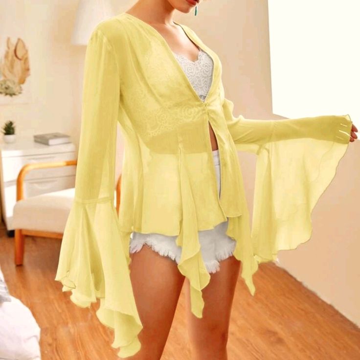 I Love Love Love This Flowy Airy Chiffon Top!! It Is A Soft Yellow Color...Perfect For The Spring Or Summer, Or Anyone Who Loves Those Retro Vintage Vibes. This Top Looks Amazing Paired With Bell Bottoms, Skinnies, Or Shorts!! Size Xs, And Is True To Size. Summer V-neck Cardigan For Party, Trendy Summer Party Cardigan, Chiffon Long Sleeve Tops For Vacation, Long Sleeve Chiffon Top For Vacation, Flowy Cardigans, Retro Tops, Soft Yellow, Button Top, Cardigan Top