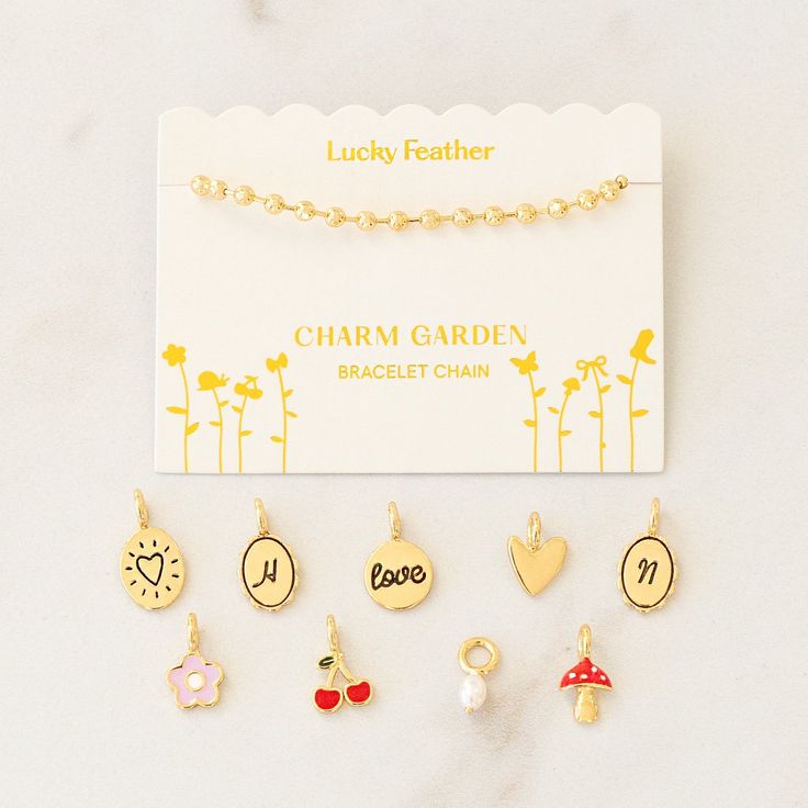 Every charm tells a story! Our gold-plated charm bracelet is the perfect way to tell yours, and it also makes the perfect, personalized gift. Oval letters have a sweet wavy frame, and shape charms are unique while staying on trend. Simply add charms below to create something special! Add up to 10 charms. 14K Gold Plated Adjustable 7-8 inches Easily add charms in the future Cute Friendship Dangling Charms, Personalized Dangle Gold Plated Charms, Personalized Gold-plated Dangle Charms, Personalized Gold Plated Dangle Charms, Trendy Gold Charm Necklaces For Personalized Gift, Dangle Charm Bracelet As A Gift, Dangle Charm Bracelet For Gifts, Dangling Charms Bracelet As A Gift, Trendy Charms With Dangling Details As Gift