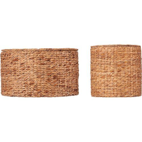 two woven baskets are shown against a white background, one is brown and the other is tan