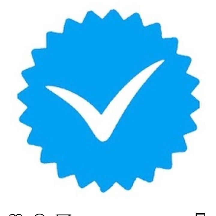 a blue seal with a check mark on it