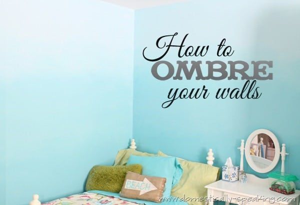 a bedroom with blue walls and a white bed in front of the wall that says how to ombre your walls