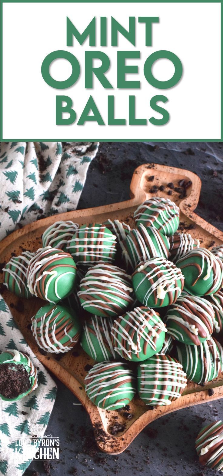 mint oreo balls on a wooden tray with green and white stripes