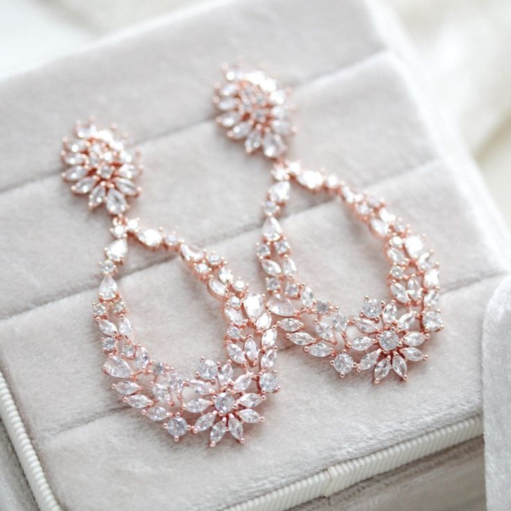 Rose gold hoop style Bridal earrings with CZ stones - KIMBERLY - Treasures by Agnes Wedding Earrings Bride Rose Gold, Sparkling Rose Gold Crystal Earrings, Rose Gold Bridal Earrings With Sparkling Stones For Anniversary, Rose Gold Sparkling Stones Bridal Earrings For Anniversary, Glamorous Rose Gold Crystal Earrings, Rose Gold Cubic Zirconia Diamond Earrings For Wedding, Rose Gold Cubic Zirconia Diamond Earrings With Sparkling Stones, Rose Gold Sparkling Cubic Zirconia Earrings, Sparkling Rose Gold Cubic Zirconia Earrings